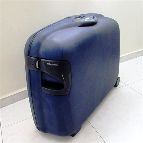 used samsonite suitcase.